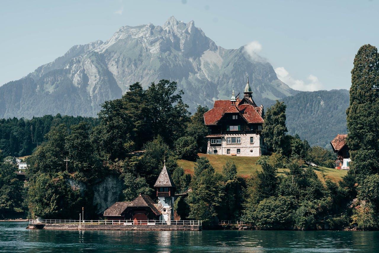 Mountain landscape with picturesque house.